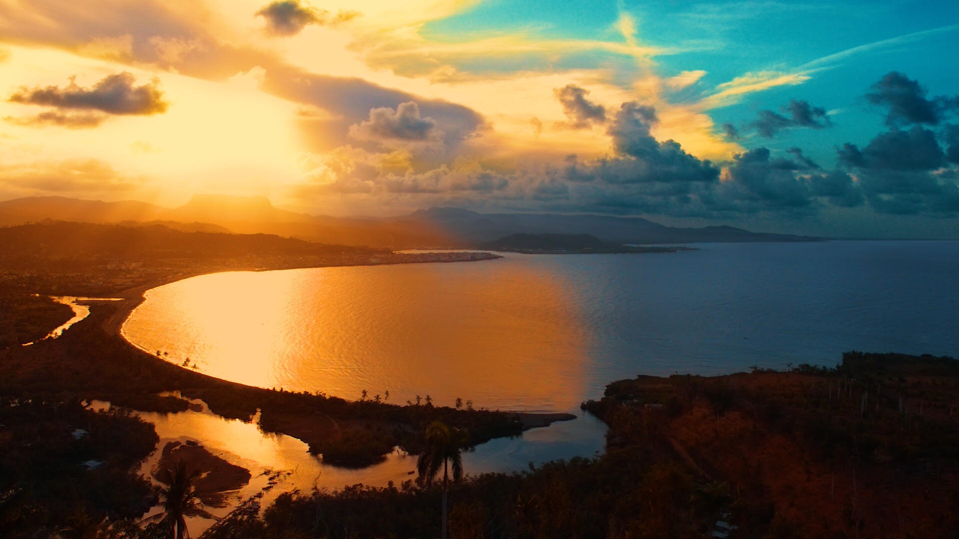 'Atardecer sobre el Mirador del Majayara' by Daniel Ross Dieguez Desde la comunidad Taína del Majayara se aprecia la ciudad de Baracoa, su playa Miel y su Yunque.